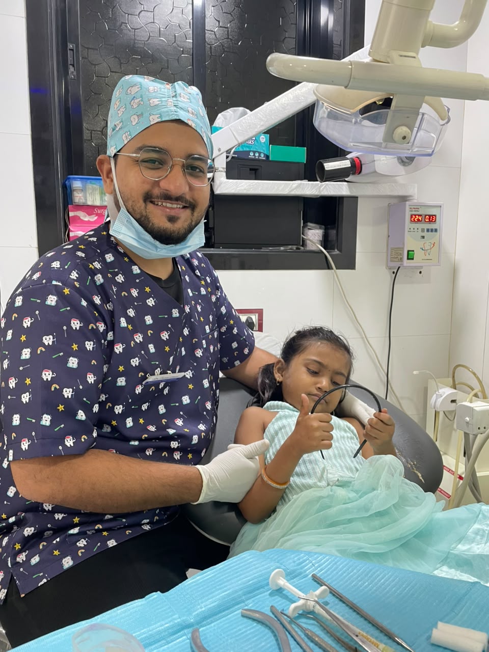 Dr. Faizan with a child patient
